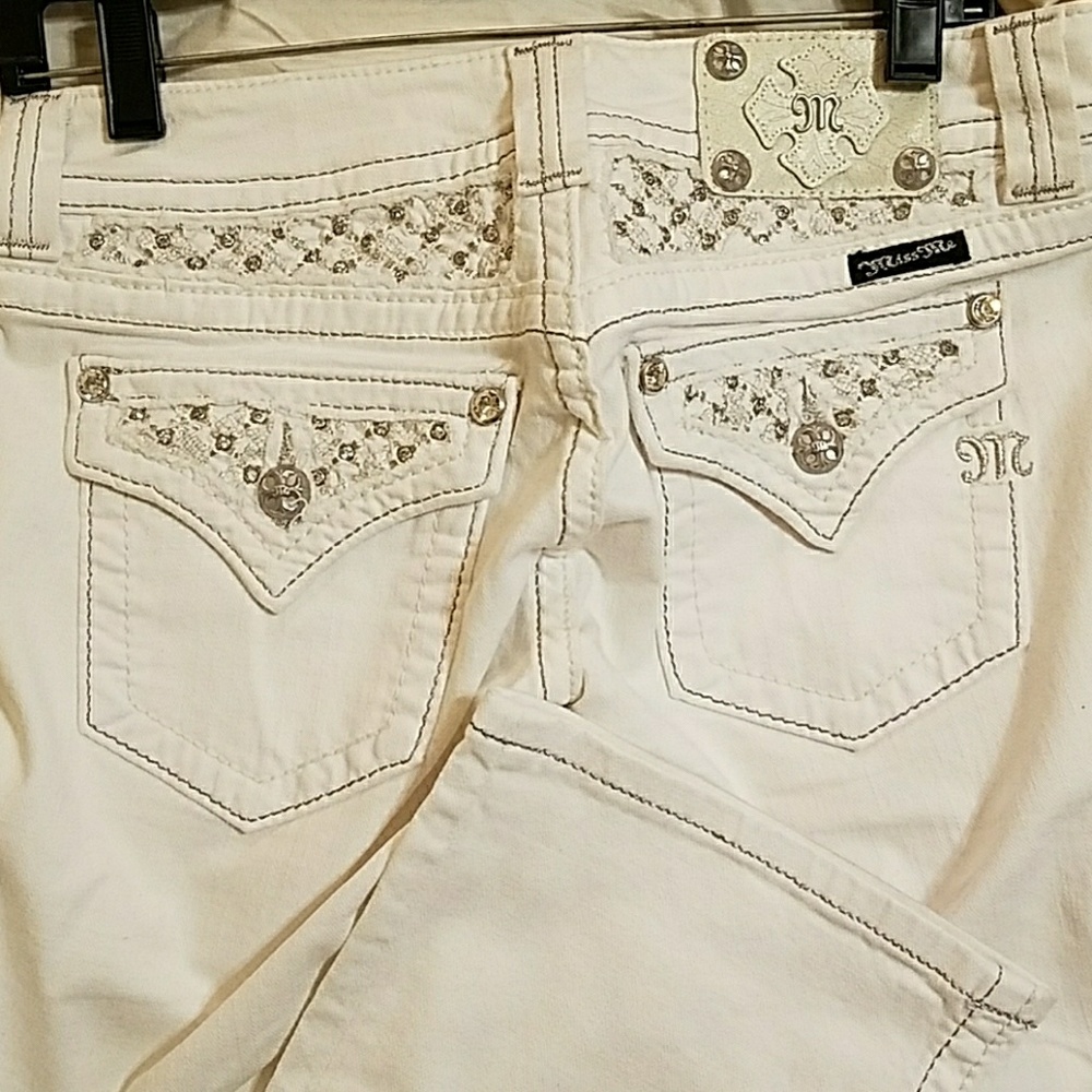 White boot cut Miss Me Jeans with rhinestones